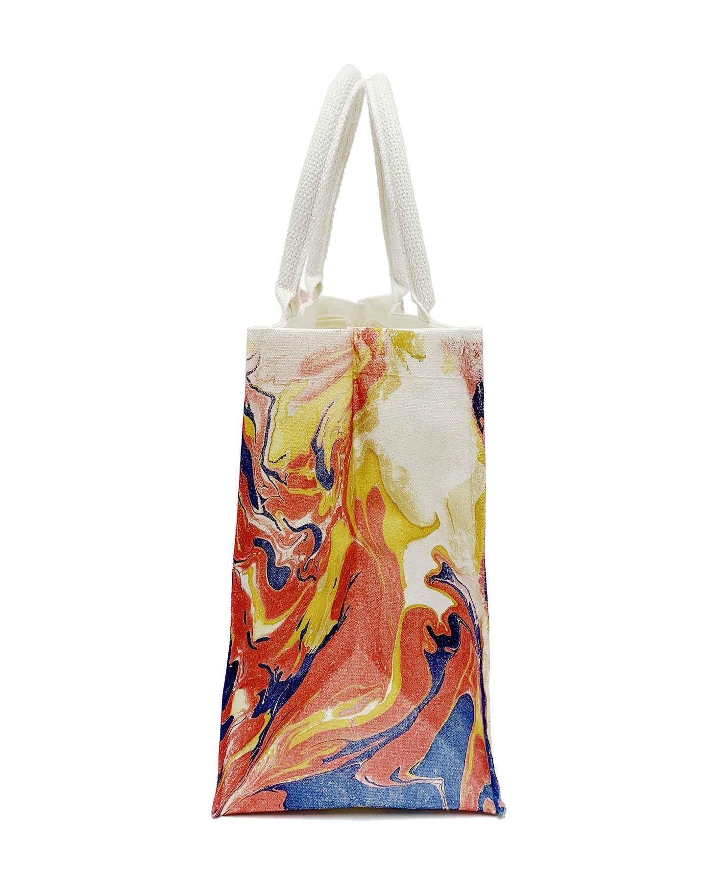 Left side of LanHeal 'Fire Phoenix' handmade lacquer-dyed canvas bag on white background, dominated by red swirls accented with touches of blue and outlined in yellow, forming fiery, dynamic patterns.