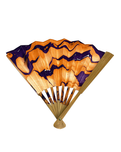 Partially open view of LanHeal 'Flying Bats' handmade folding fan on white background, with a detailed bat design visible.